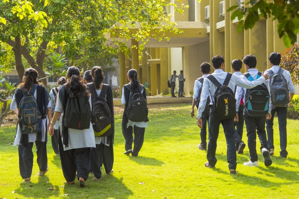 image shows that a group of students going to college